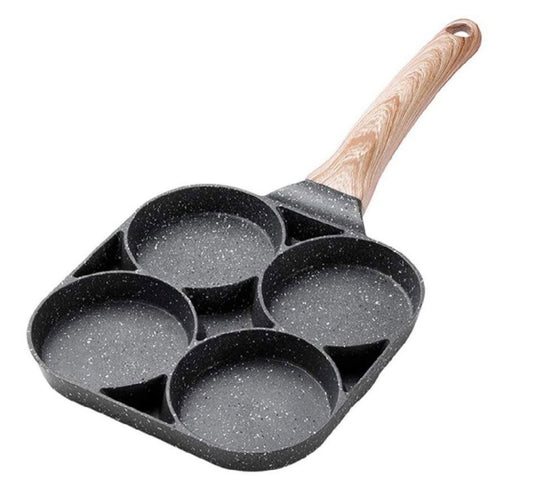 A square four-compartment pan with a dark gray speckled non-stick coating and a light brown wood-grain handle, shown on a plain white background.