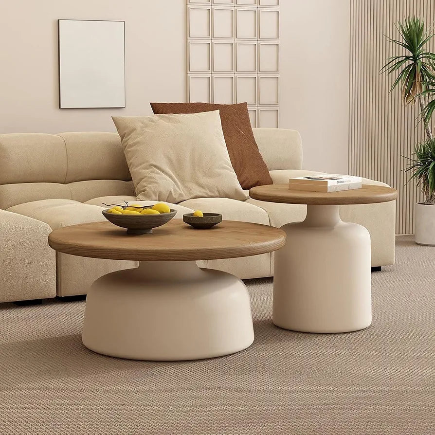 Modern living room with beige sofa, wooden coffee table, and decorative elements.