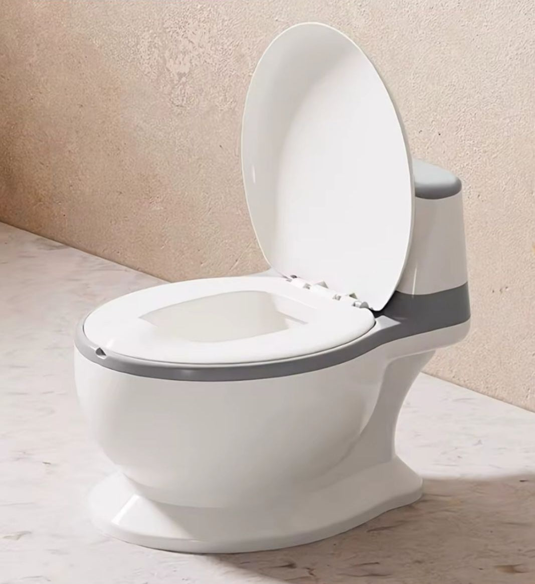 White toilet with an open lid on a beige floor.