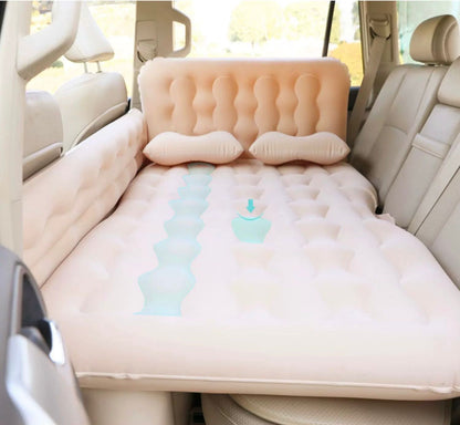 Inflatable car seat cover with a soft top layer in a vehicle.