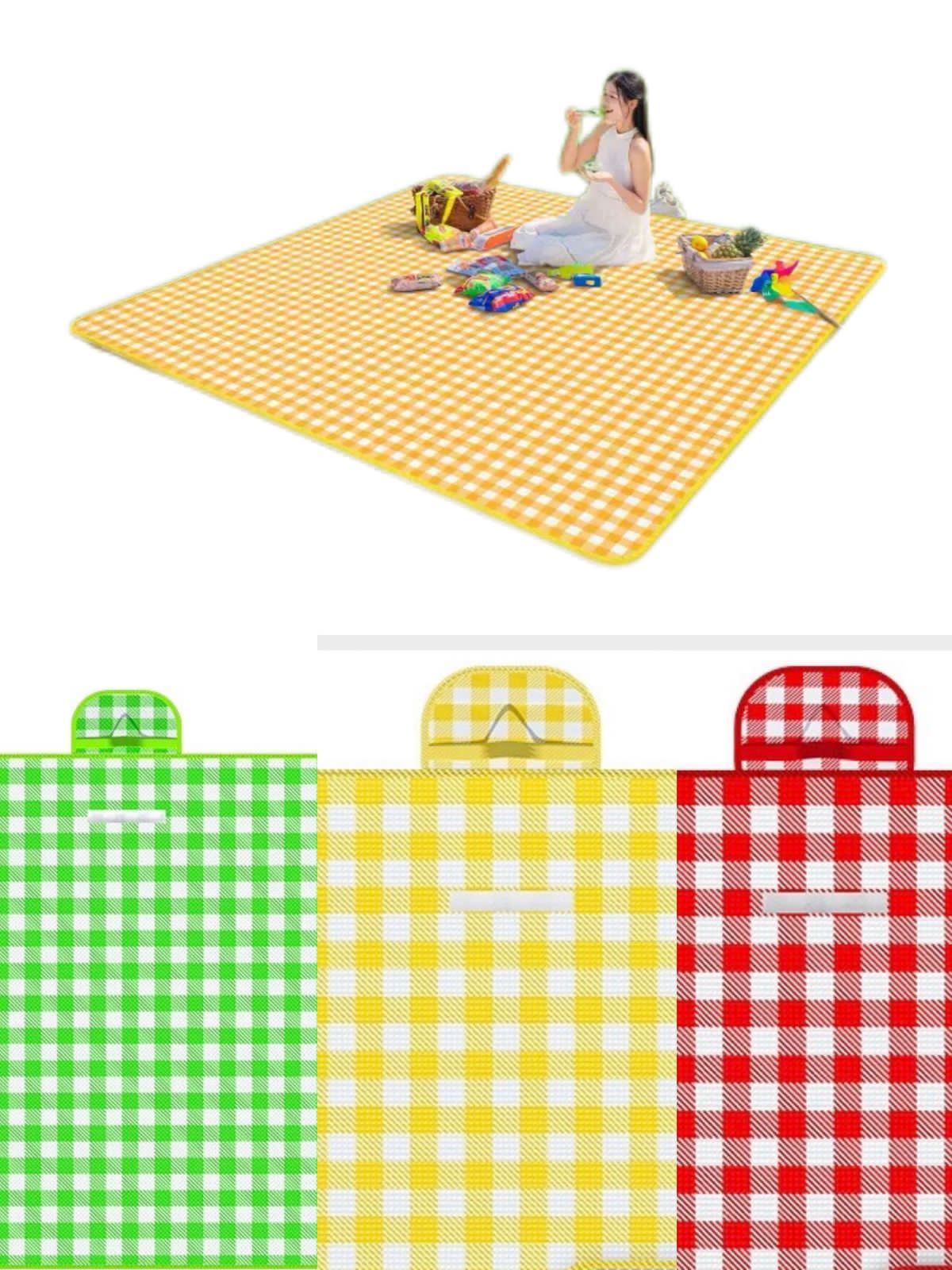 Yellow checkered picnic mat with a person sitting on it, surrounded by picnic items.