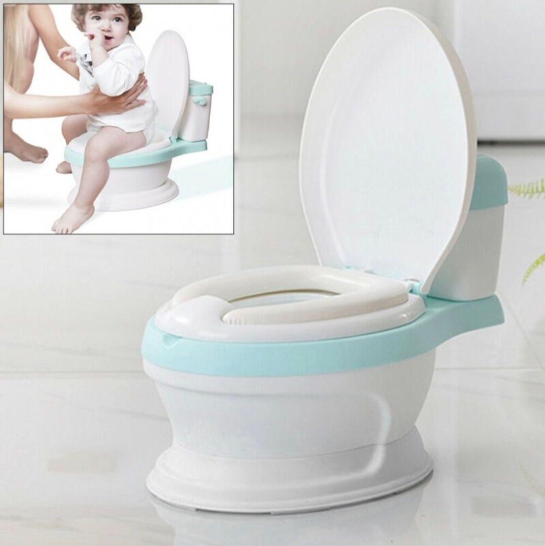Children's toilet seat with a inset showing a child using it