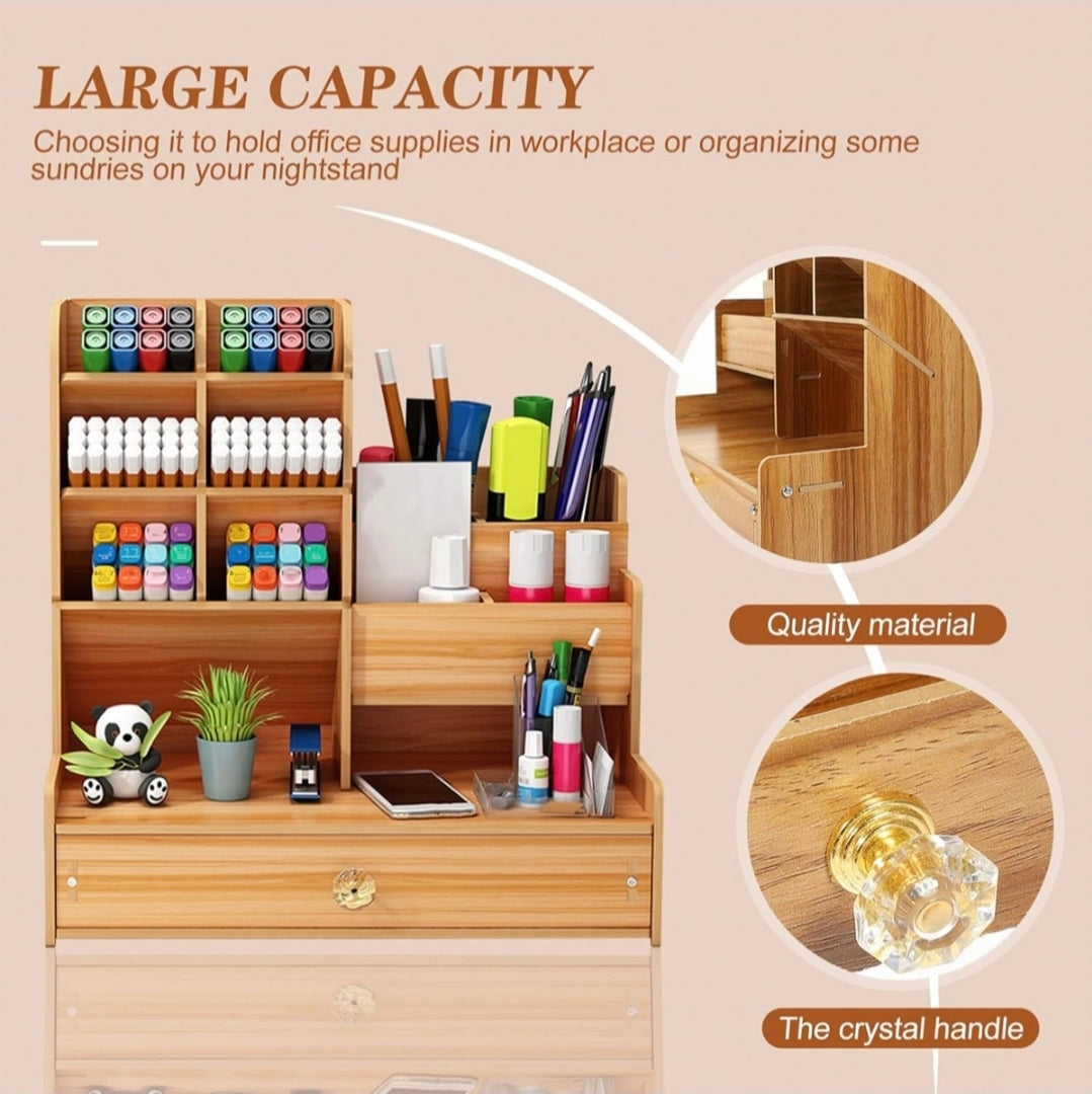 Wooden office supply organizer with various items on a beige background