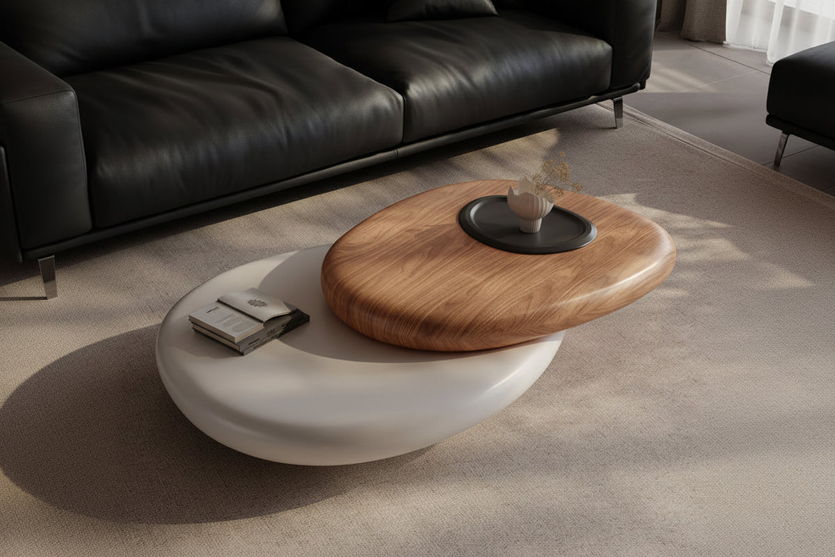 Modern coffee table with wooden top and white base in a living room setting.