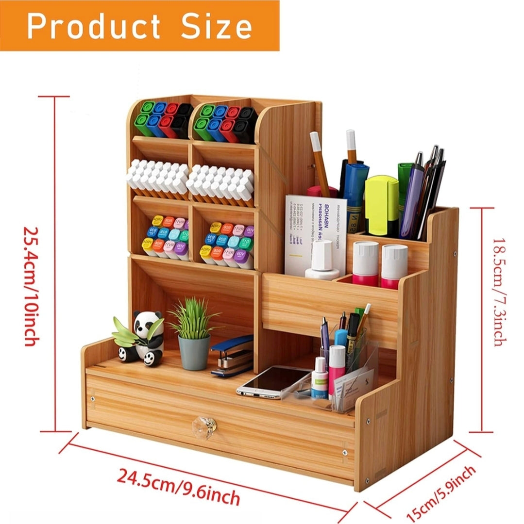 Wooden desk organizer with various stationery items and dimensions displayed.