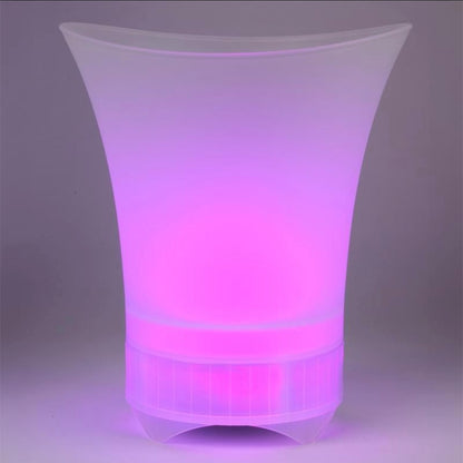 Transparent plastic chair with purple LED lighting on a gray background