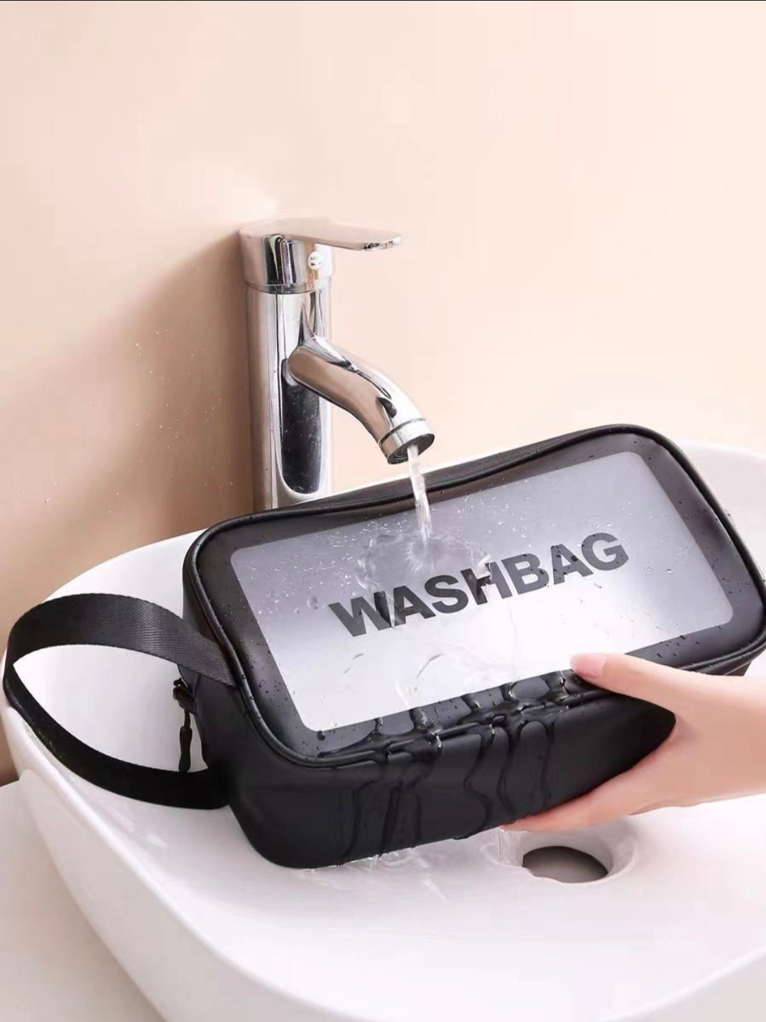 WASHBAG being rinsed under a faucet in a sink