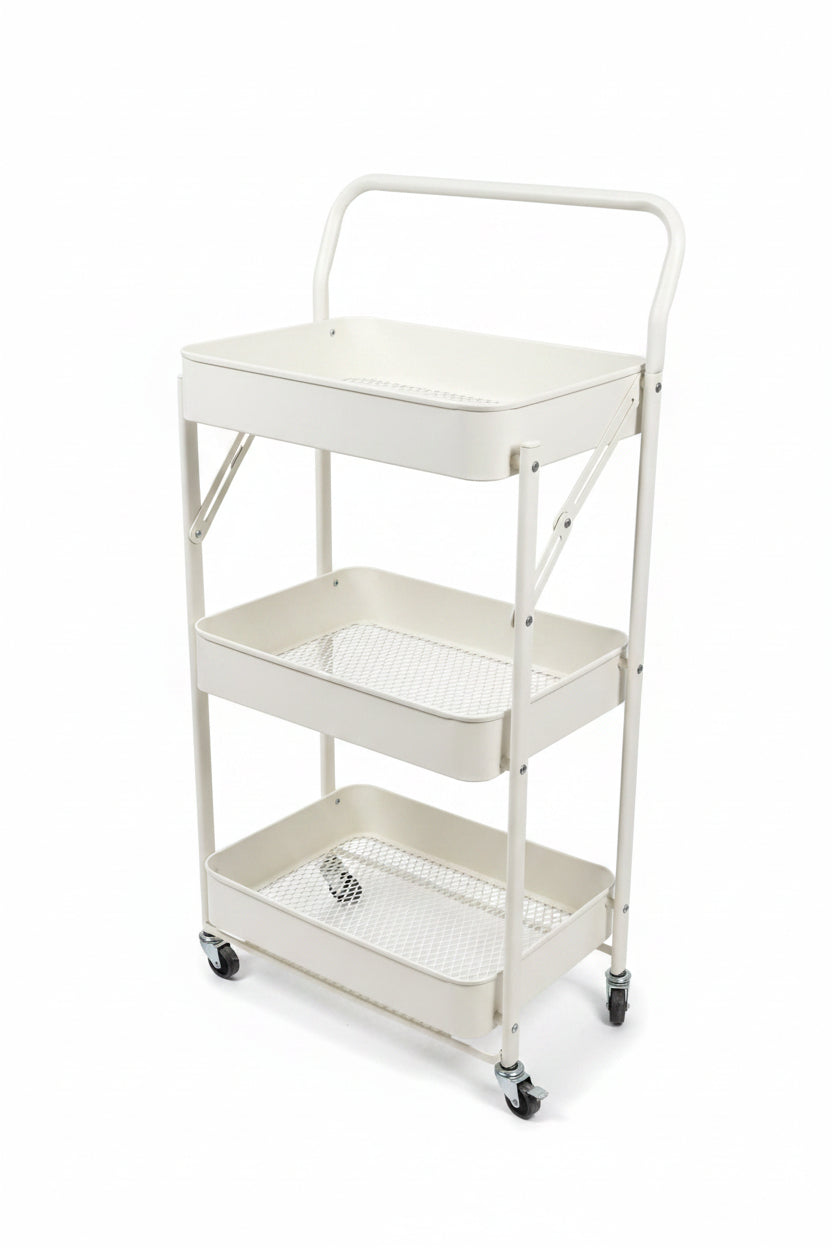 A three-tier white metal rolling cart with mesh shelves and a top handle, shown in an indoor showroom setting with gray tiled floors and storage cabinets in the background.