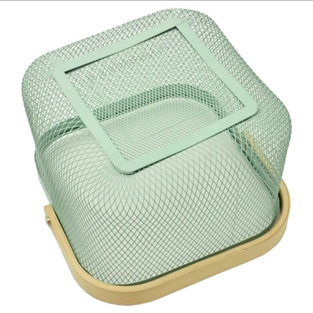 A square mesh-covered storage basket or organizer with a light wood base and a pale mint green frame, shown on a plain white background.