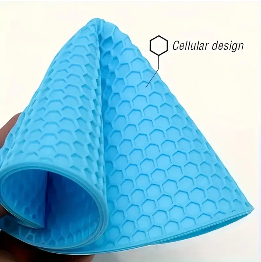 Blue textured mat with cellular design on a white background
