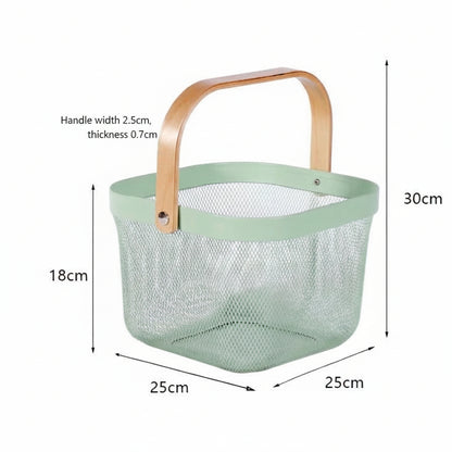 A mint green mesh storage basket with a light wood handle, shown with dimension labels and arrows indicating measurements of 25cm by 25cm by 30cm, plus handle width 2.5cm and thickness 0.