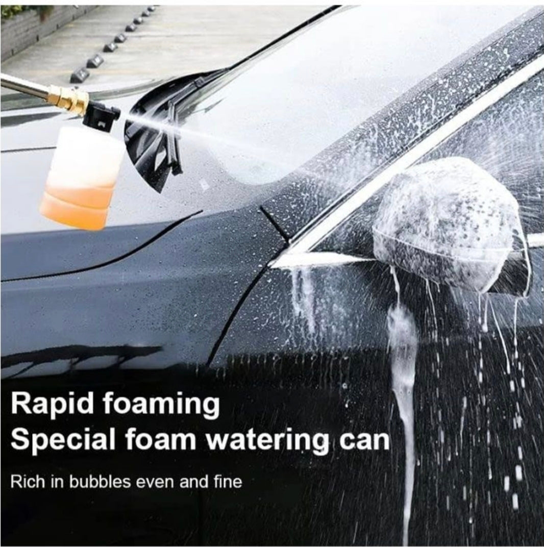 Car being washed with a foam watering can, emphasizing rapid foaming and water pressure.